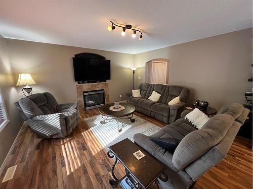 4049 Bradwell Street, Hinton, AB - Indoor Photo Showing Living Room With Fireplace