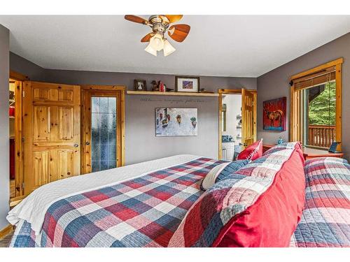 104 Silvertip Ridge, Canmore, AB - Indoor Photo Showing Bedroom