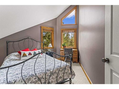 104 Silvertip Ridge, Canmore, AB - Indoor Photo Showing Bedroom