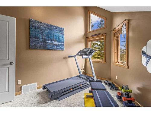 104 Silvertip Ridge, Canmore, AB - Indoor Photo Showing Gym Room