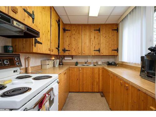 318 Carefoot Street, Rural Athabasca County, AB - Indoor Photo Showing Kitchen With Double Sink