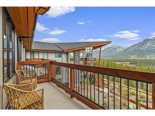 311-106 Stewart Creek Rise, Canmore, AB - Outdoor With Deck Patio Veranda With Exterior