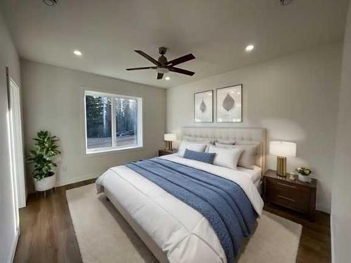 25, 660023-Range Road 224, Rural Athabasca County, AB - Indoor Photo Showing Bedroom