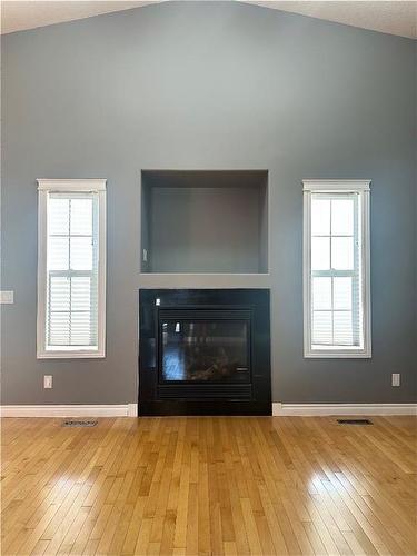 22 Cedar Heights, Whitecourt, AB - Indoor Photo Showing Living Room With Fireplace