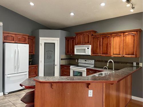 22 Cedar Heights, Whitecourt, AB - Indoor Photo Showing Kitchen With Double Sink