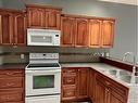 22 Cedar Heights, Whitecourt, AB  - Indoor Photo Showing Kitchen With Double Sink 