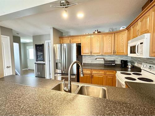 24 Poplar Drive, Whitecourt, AB - Indoor Photo Showing Kitchen With Double Sink