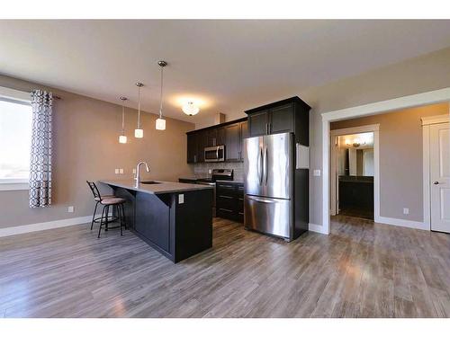 302-605 6 Avenue, Slave Lake, AB - Indoor Photo Showing Kitchen With Stainless Steel Kitchen