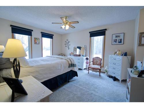 590029 Range Road 115, Rural Woodlands County, AB - Indoor Photo Showing Bedroom