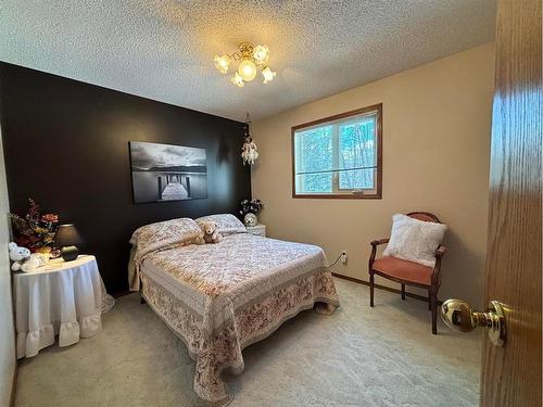 590029 Range Road 115, Rural Woodlands County, AB - Indoor Photo Showing Bedroom