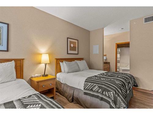 281-91B Three Sisters Drive, Canmore, AB - Indoor Photo Showing Bedroom
