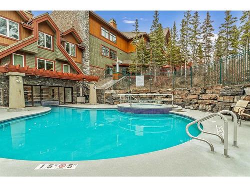 281-91B Three Sisters Drive, Canmore, AB - Outdoor With In Ground Pool