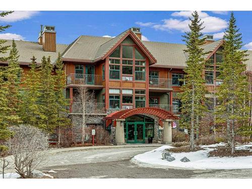 281-91B Three Sisters Drive, Canmore, AB - Outdoor With Facade