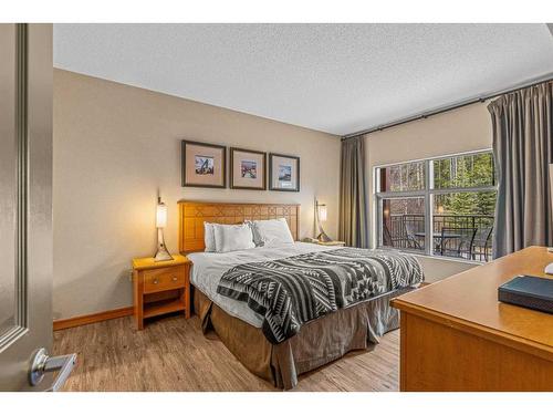 281-91B Three Sisters Drive, Canmore, AB - Indoor Photo Showing Bedroom