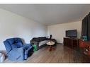 109-201 12 Avenue Sw, Slave Lake, AB  - Indoor Photo Showing Living Room 
