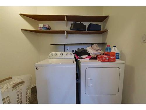 109-201 12 Avenue Sw, Slave Lake, AB - Indoor Photo Showing Laundry Room