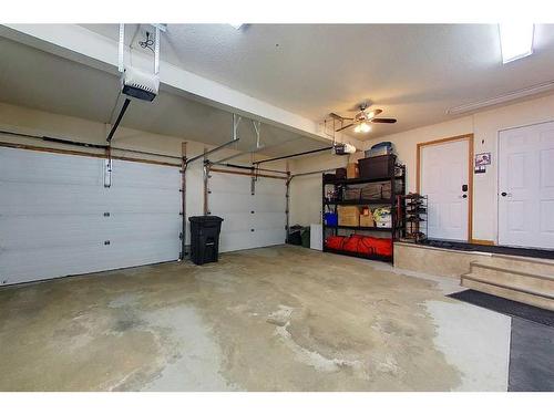 13 Springwood Drive Ne, Slave Lake, AB - Indoor Photo Showing Garage