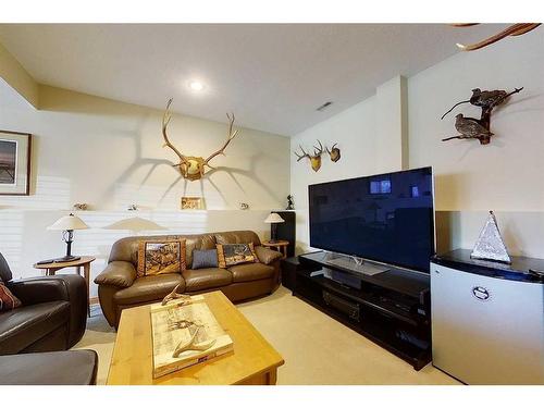 13 Springwood Drive Ne, Slave Lake, AB - Indoor Photo Showing Living Room