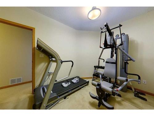13 Springwood Drive Ne, Slave Lake, AB - Indoor Photo Showing Gym Room