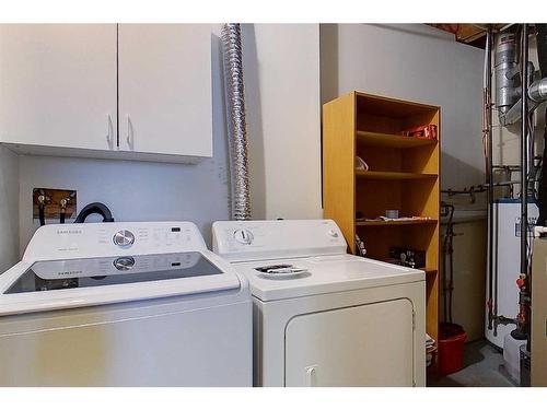 13 Springwood Drive Ne, Slave Lake, AB - Indoor Photo Showing Laundry Room