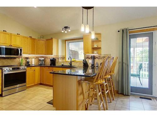 13 Springwood Drive Ne, Slave Lake, AB - Indoor Photo Showing Kitchen