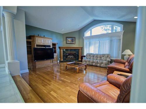 30 Ravine Drive, Whitecourt, AB - Indoor Photo Showing Living Room With Fireplace