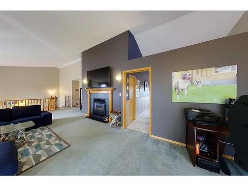 2-300 12 Street Sw, Slave Lake, AB - Indoor With Fireplace