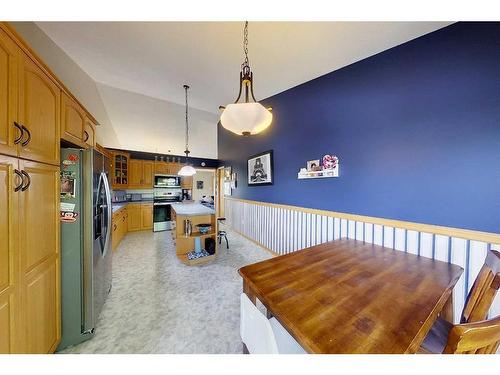 2-300 12 Street Sw, Slave Lake, AB - Indoor Photo Showing Living Room With Fireplace