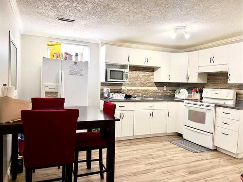 5838 10 Avenue, Edson, AB - Indoor Photo Showing Kitchen With Double Sink