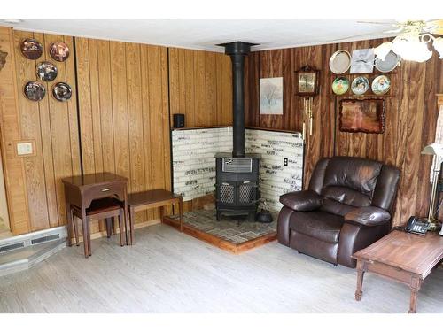 53515 Range Road 183, Rural Yellowhead County, AB - Indoor Photo Showing Living Room With Fireplace