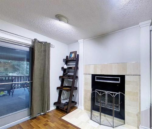 5435 15 Avenue, Edson, AB - Indoor Photo Showing Other Room With Fireplace