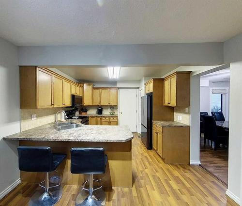 5435 15 Avenue, Edson, AB - Indoor Photo Showing Kitchen With Double Sink