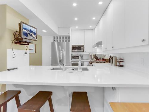 30 Antelope, Banff, AB - Indoor Photo Showing Kitchen With Upgraded Kitchen