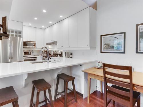 30 Antelope, Banff, AB - Indoor Photo Showing Kitchen With Double Sink With Upgraded Kitchen