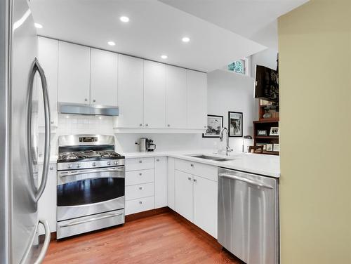 30 Antelope, Banff, AB - Indoor Photo Showing Kitchen With Double Sink With Upgraded Kitchen