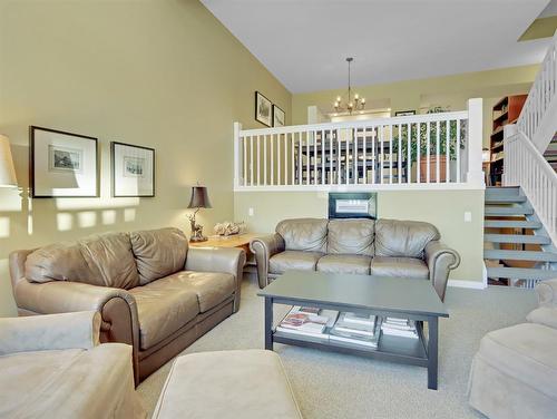 30 Antelope, Banff, AB - Indoor Photo Showing Living Room