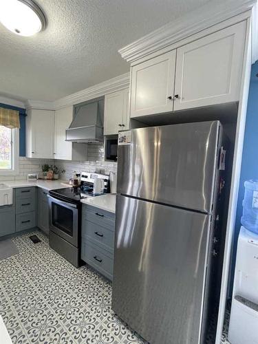 67 Chickadee Drive, Whitecourt, AB - Indoor Photo Showing Kitchen With Upgraded Kitchen