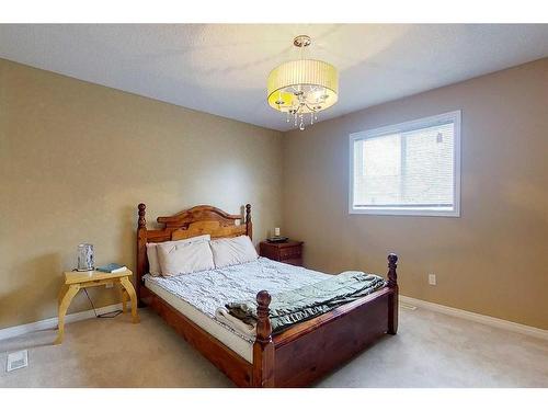 47 Springwood Drive Ne, Slave Lake, AB - Indoor Photo Showing Bedroom