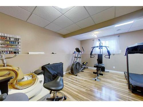 47 Springwood Drive Ne, Slave Lake, AB - Indoor Photo Showing Gym Room