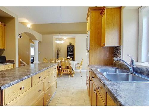 47 Springwood Drive Ne, Slave Lake, AB - Indoor Photo Showing Kitchen With Double Sink