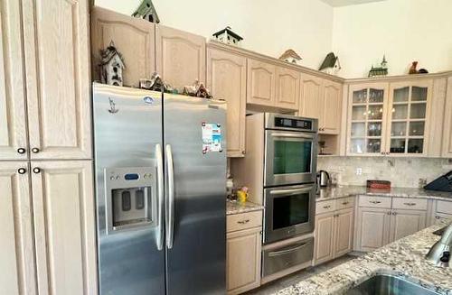 50 Lakeview Heights, Canyon Creek, AB - Indoor Photo Showing Kitchen With Stainless Steel Kitchen