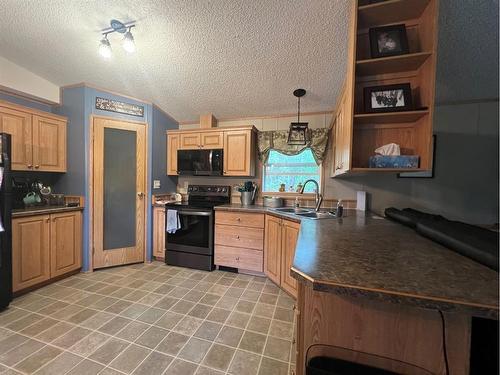 591021 Range Road 123A, Rural Woodlands County, AB - Indoor Photo Showing Kitchen With Double Sink