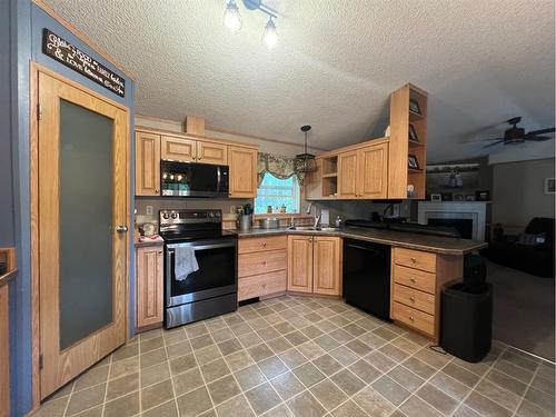 591021 Range Road 123A, Rural Woodlands County, AB - Indoor Photo Showing Kitchen With Double Sink