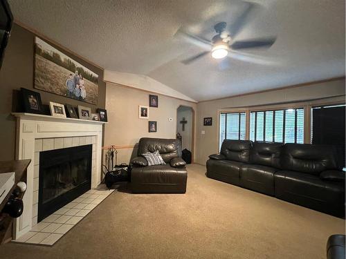 591021 Range Road 123A, Rural Woodlands County, AB - Indoor Photo Showing Living Room With Fireplace