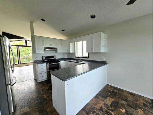 33 Baly Road, Whitecourt, AB - Indoor Photo Showing Kitchen With Double Sink