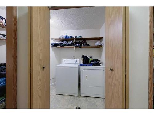 102-201 12 Avenue Sw, Slave Lake, AB - Indoor Photo Showing Laundry Room