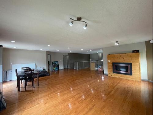 1506 42 Street, Edson, AB - Indoor Photo Showing Other Room With Fireplace