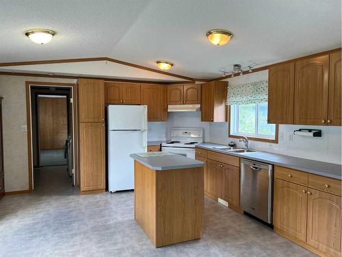 907 6 Avenue, Fox Creek, AB - Indoor Photo Showing Kitchen With Double Sink