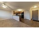 106-709 6 Avenue Se, Slave Lake, AB  - Indoor Photo Showing Kitchen 