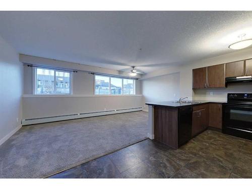 106-709 6 Avenue Se, Slave Lake, AB - Indoor Photo Showing Kitchen